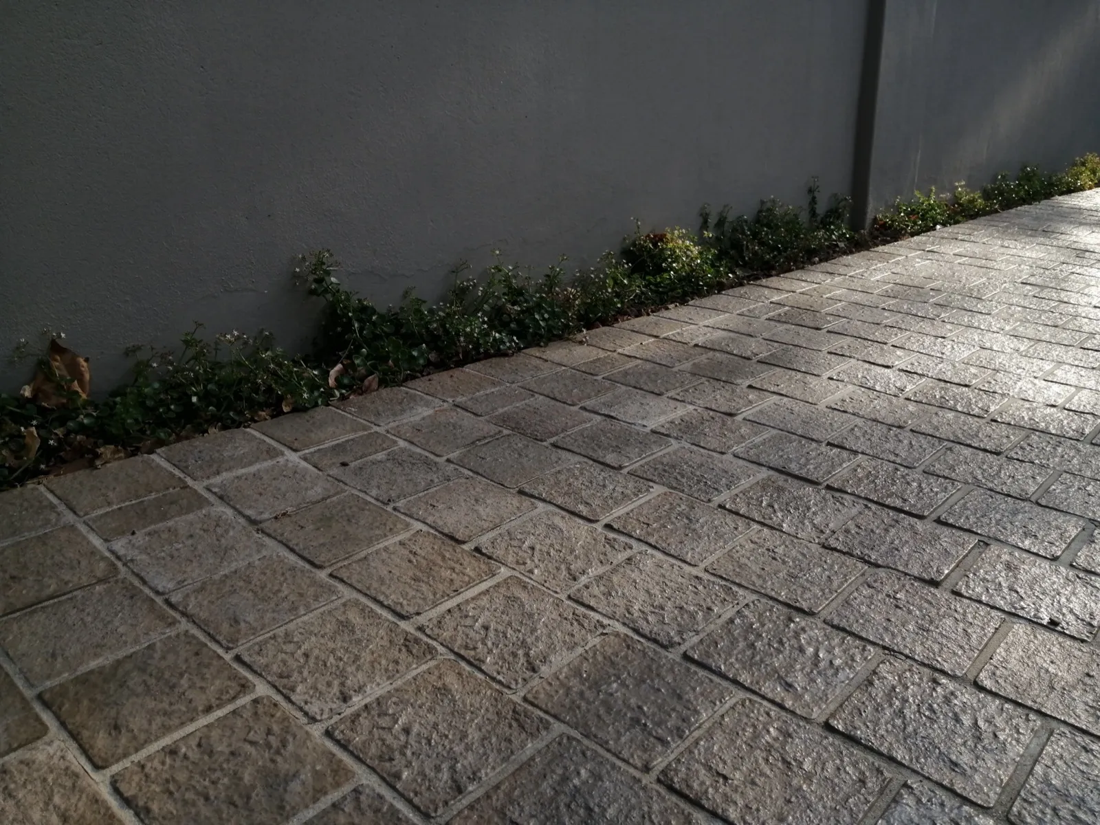 CAPECAST paving textures — charcoal and grey finishes
