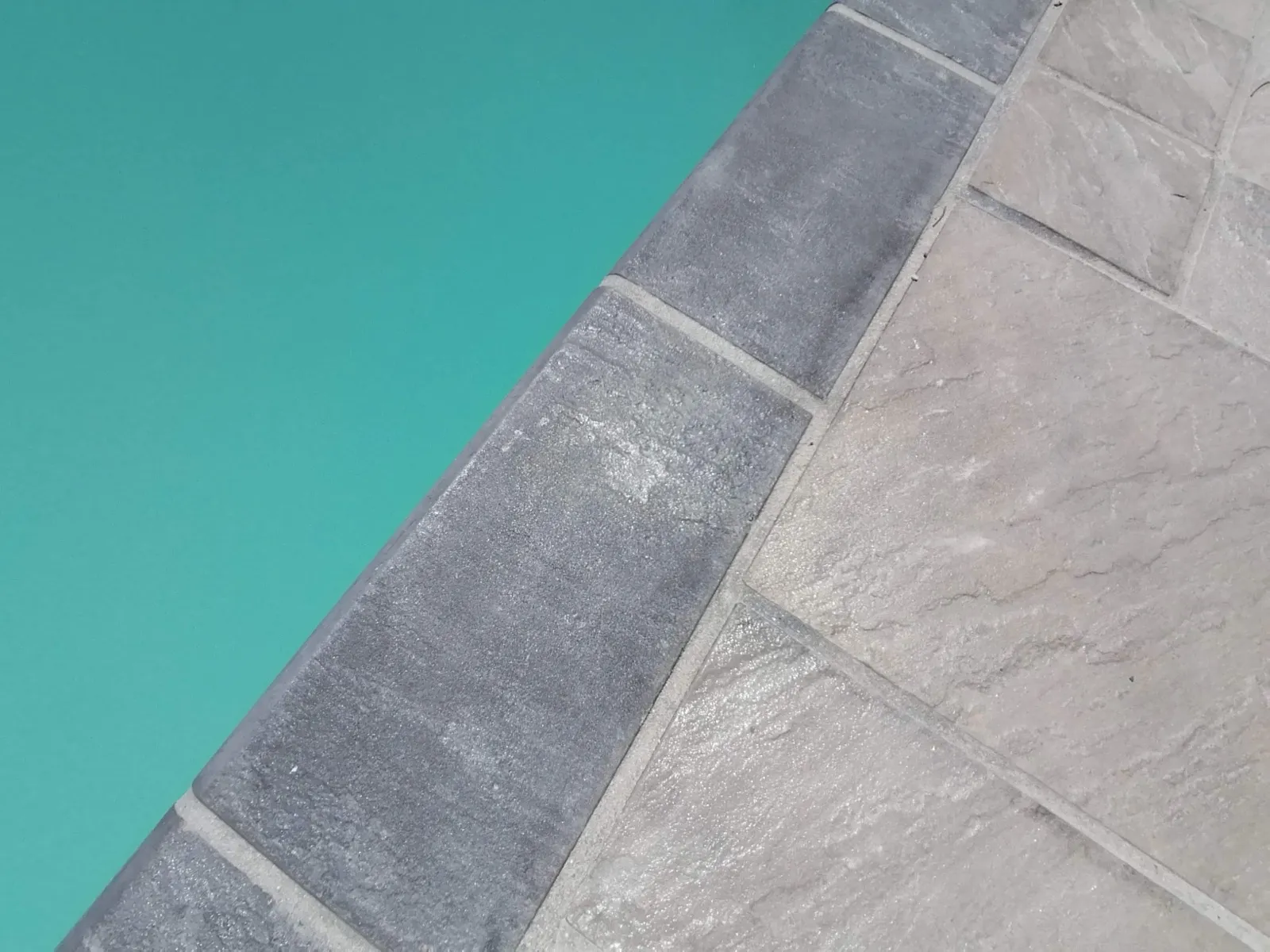 CAPECAST paving textures — charcoal and grey finishes